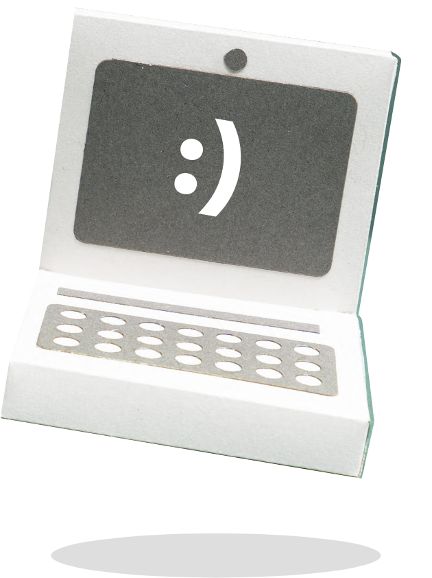 Image of computer with happy face on it