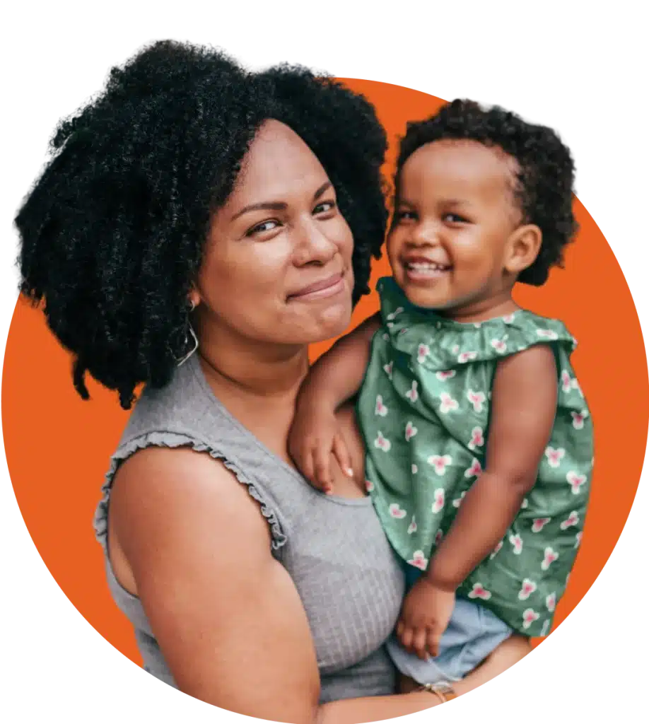 Smiling mom holding a baby