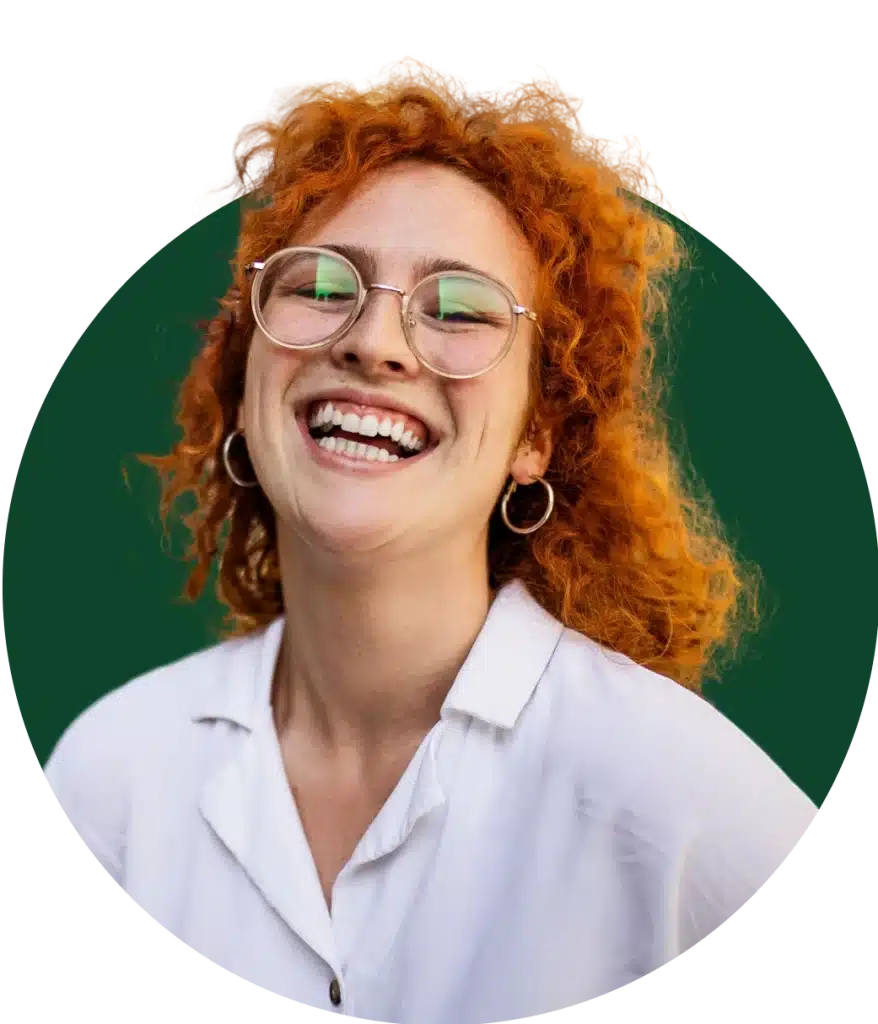 Woman with glasses smiling