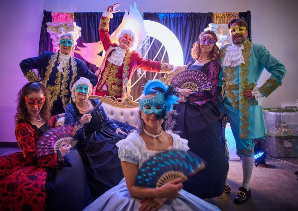Chamber members dress up in Masquerade attire