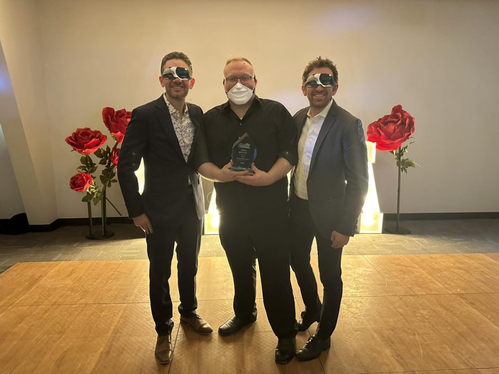 Josh and Jordan Wehe, Jade's Co-CEOs, accept the 2025 Business of the Year Award from the Alamosa Chamber at the Masquerade Gala