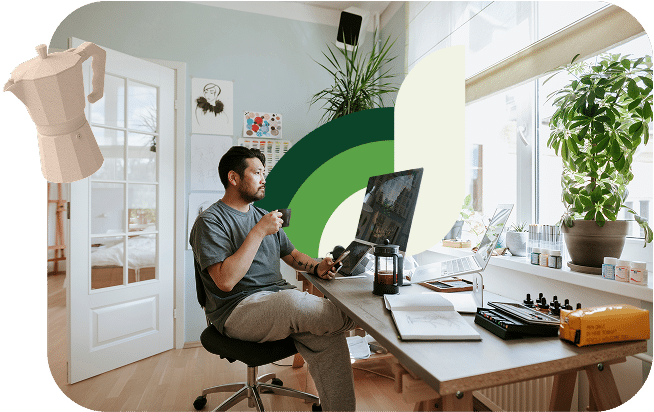 Man drinking coffee while working from home